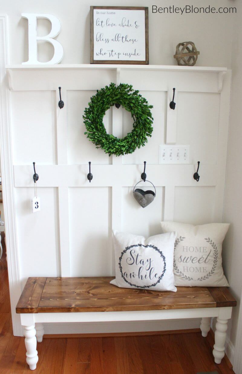 Green Wreath Among the Wall Hooks