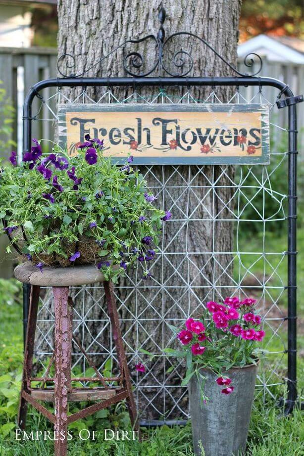 Reclaimed Metal Gate with a Stenciled Sign
