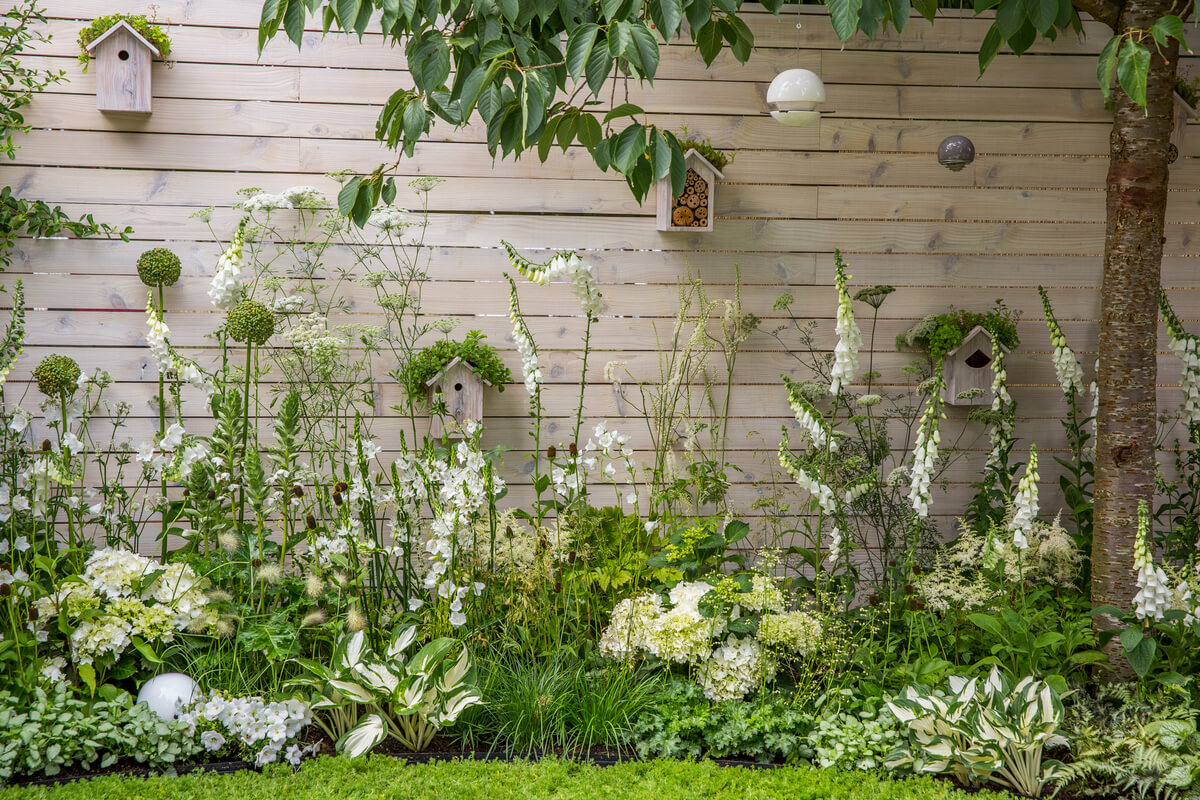 Pretty Birdhouse Display on the Fence