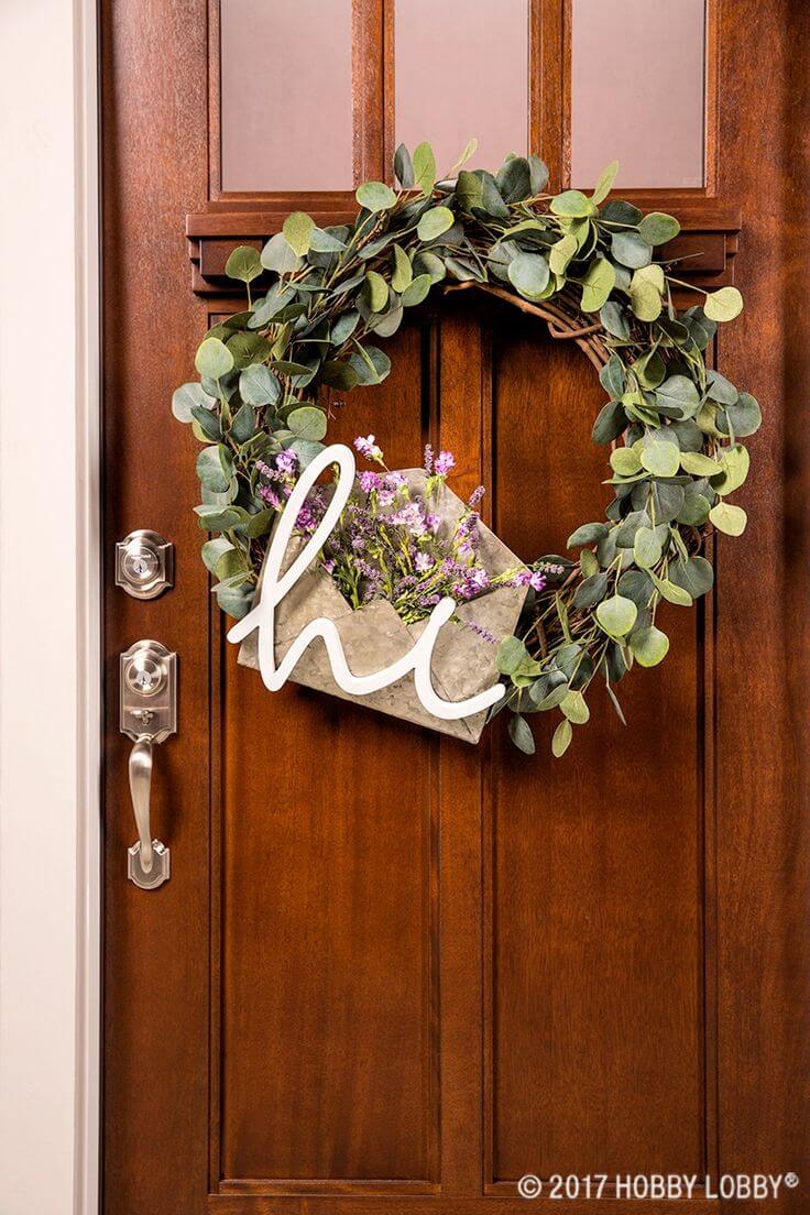 Wreath with Green Leaves and a Decorated Envelope