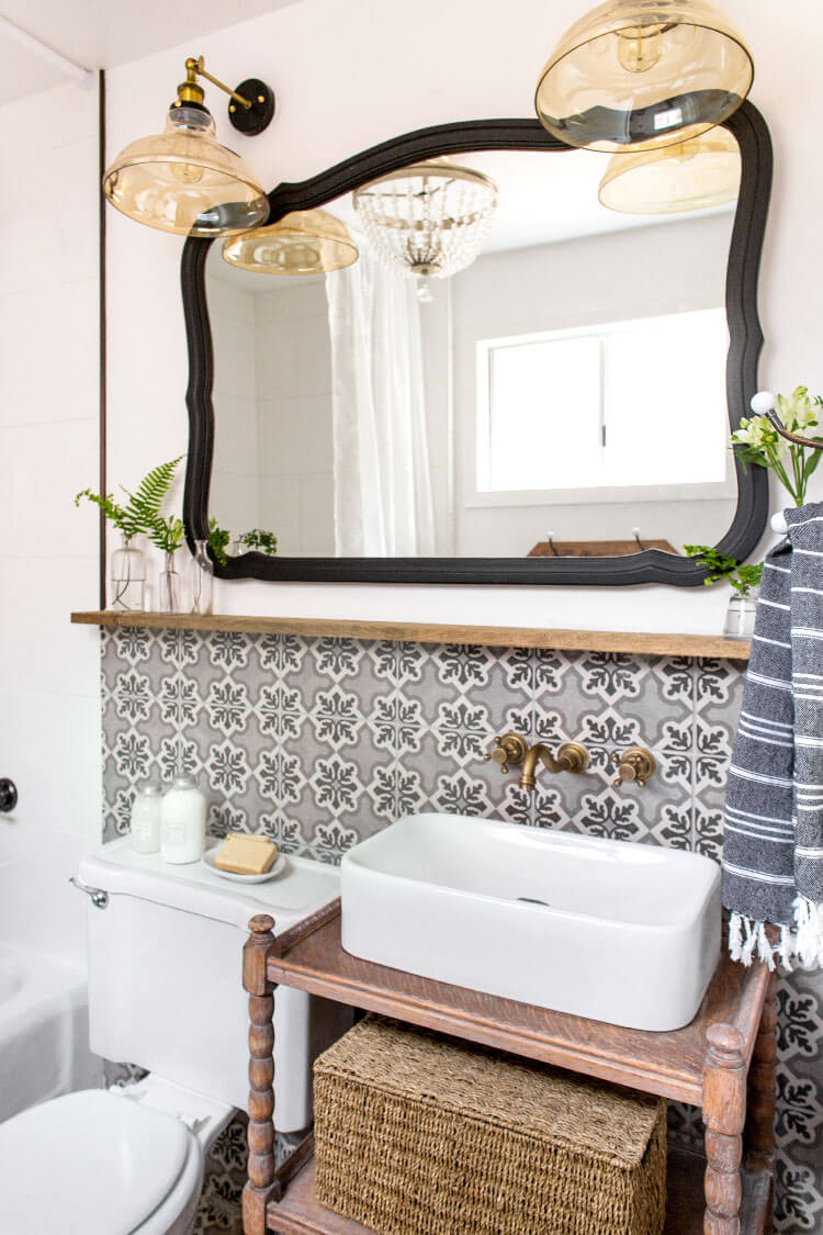 Intricate Tiled Backsplash with Old Fashioned Lights