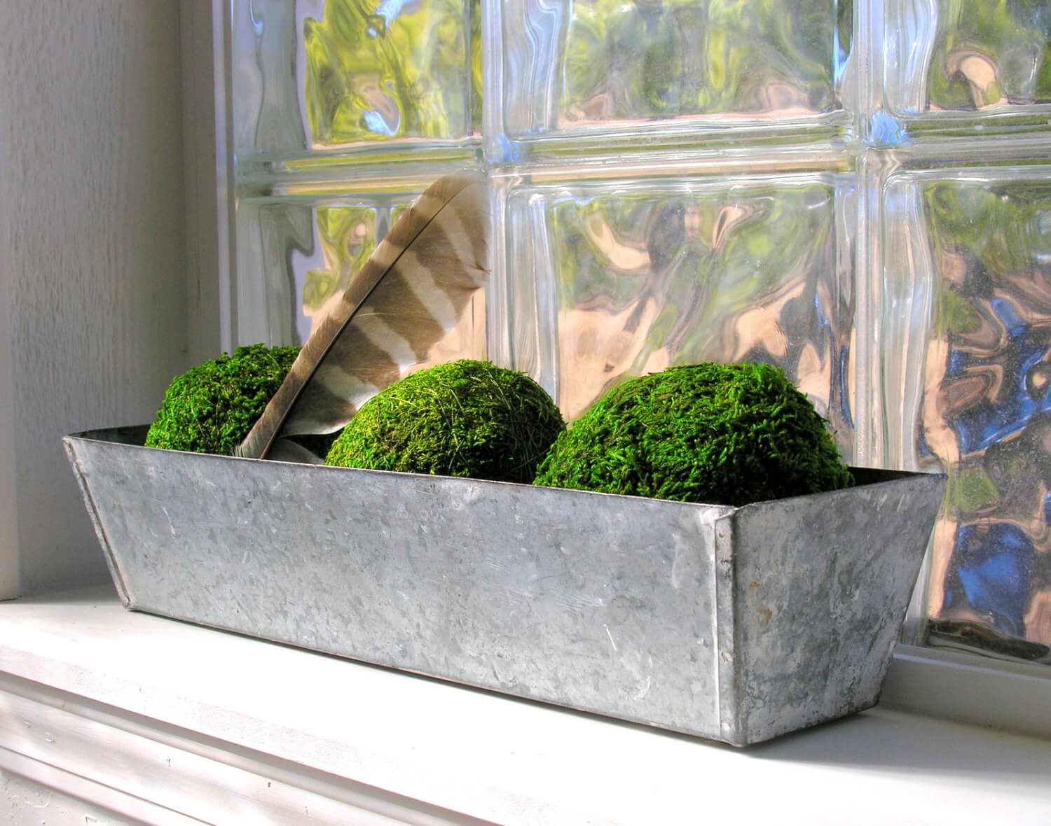 Topiary Balls in a Long Metal Holder with Feather