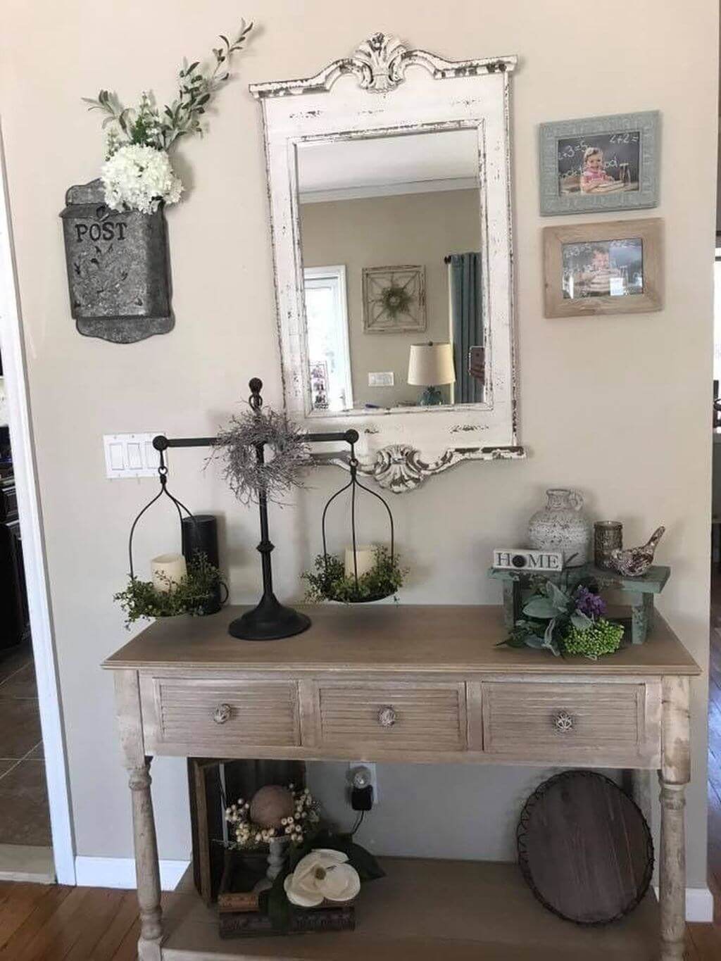 Graceful Distressed Mirror over an Entry Table