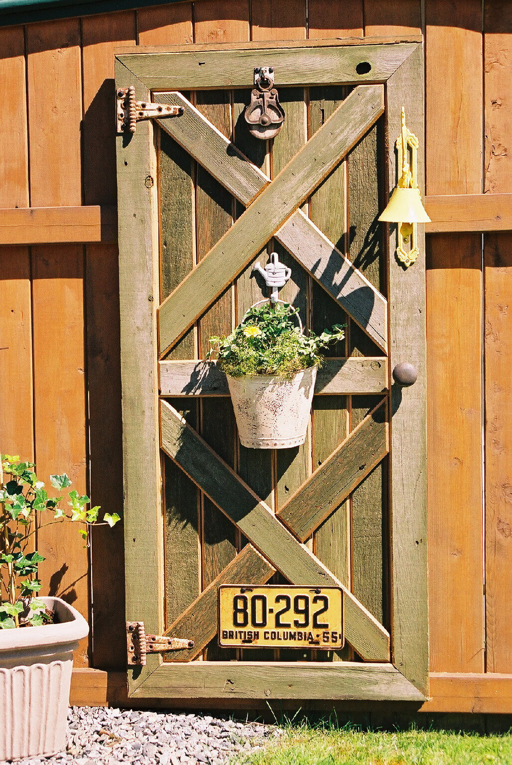 Hang an Old Door on the Fence