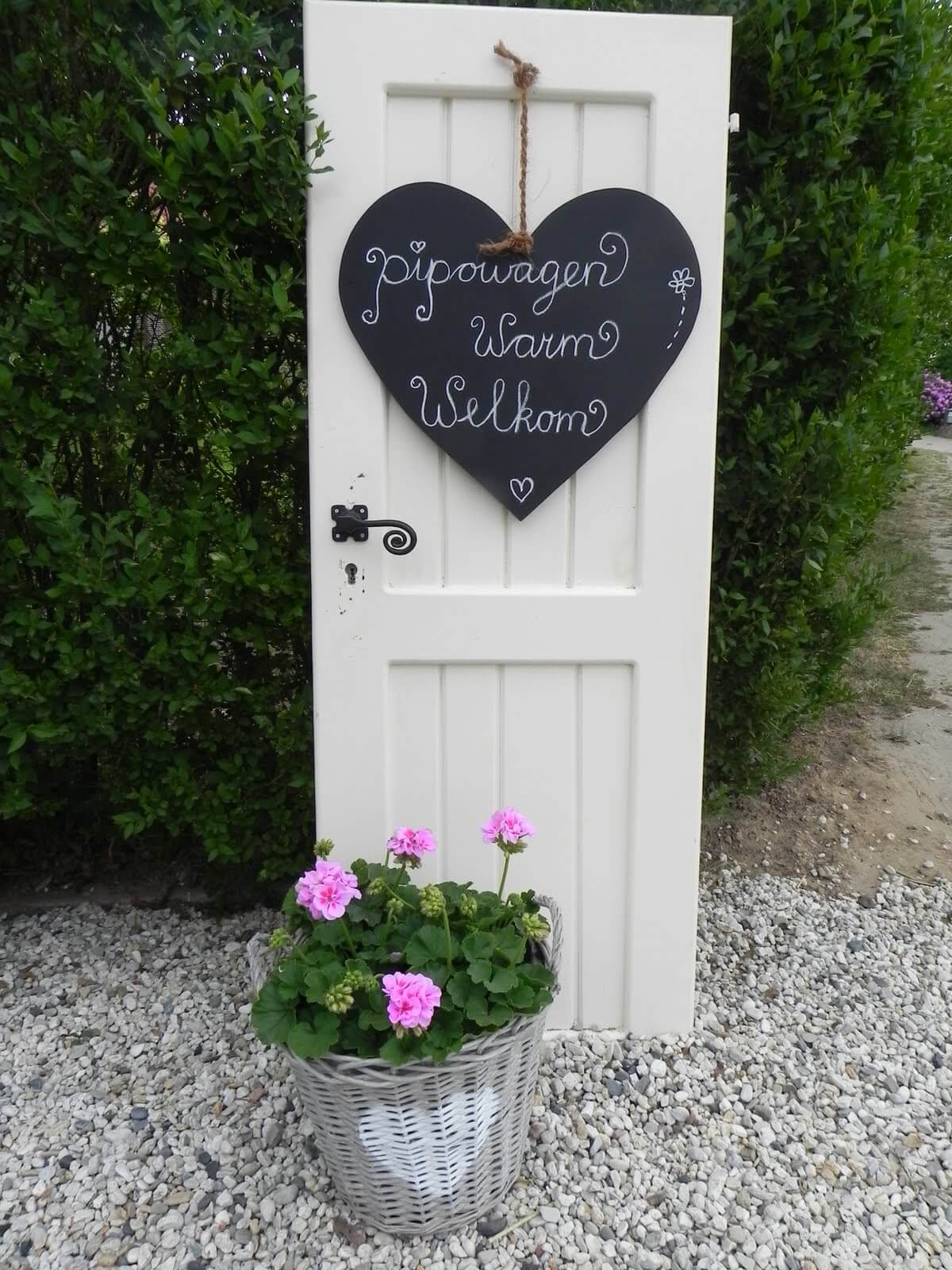 Old Door Outdoor Decor Idea with Chalkboard Signs