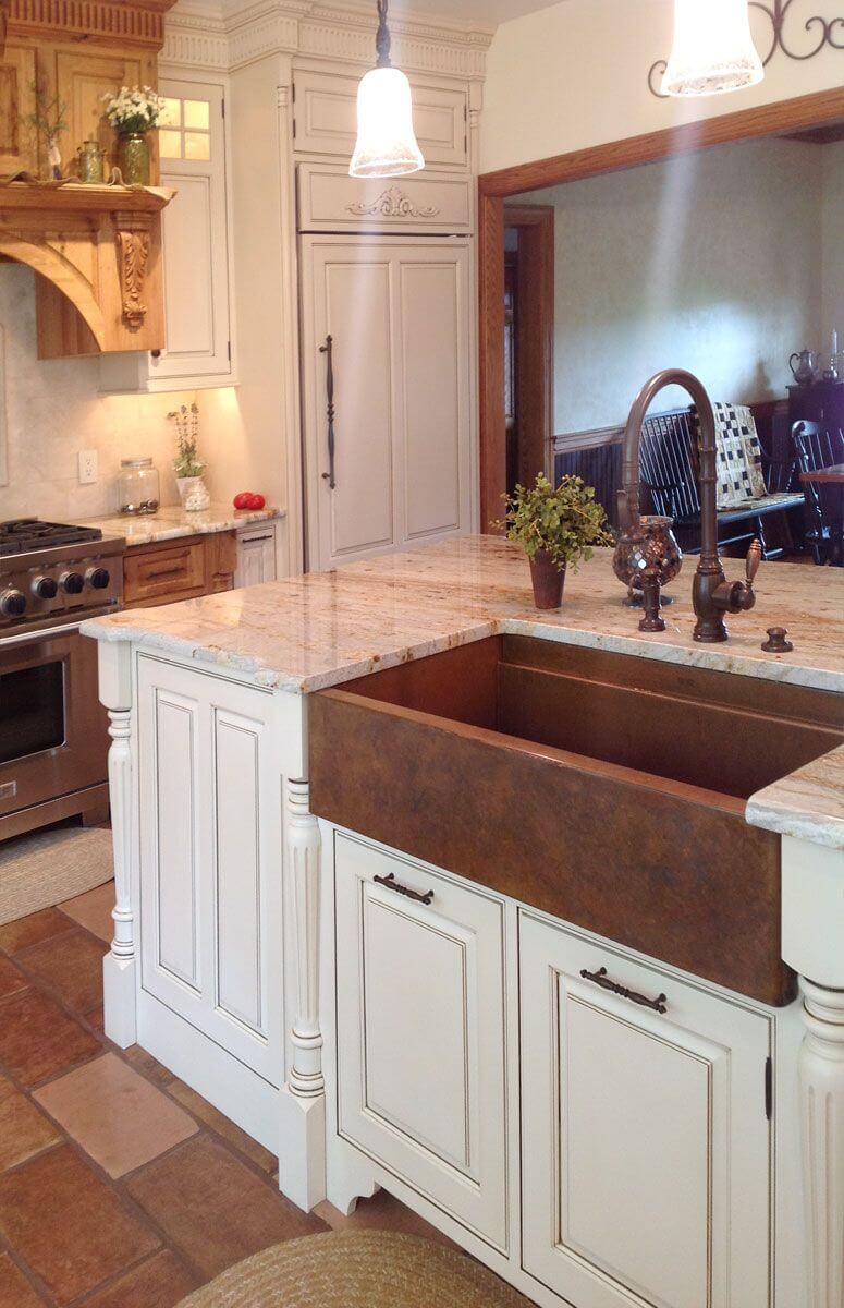 Marble Countertop and Beaten Copper Sink