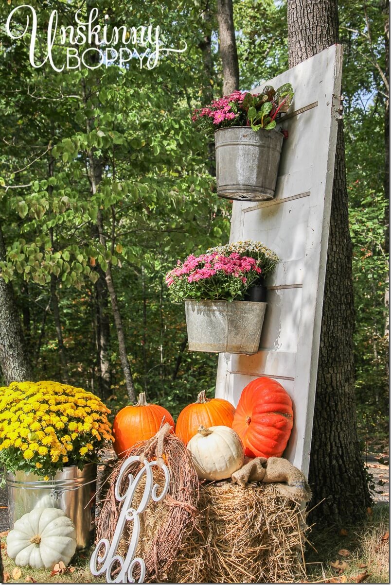 Fall Display with Mums and Pumpkins