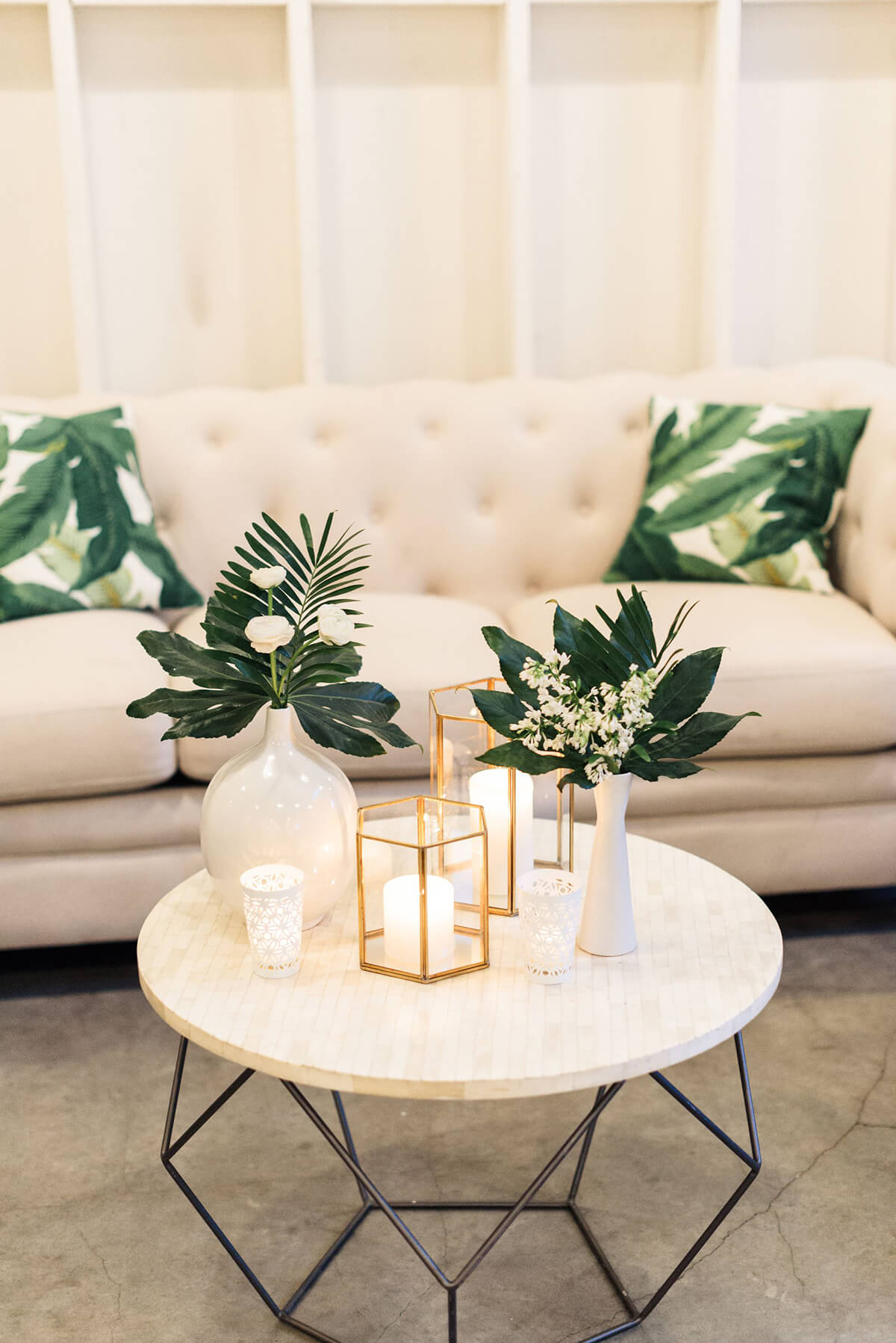 Elegant Candles, Foliage, and Flower Arrangement