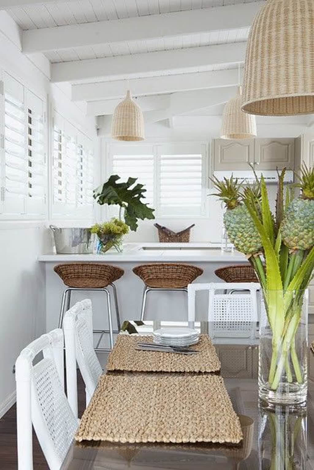 Kitchen Area with Woven Chairs and Shutters