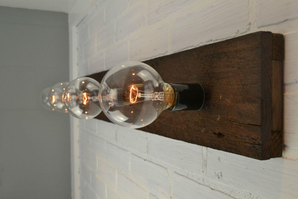 Vintage Fence Pickets Make for a Stunning Vanity Light