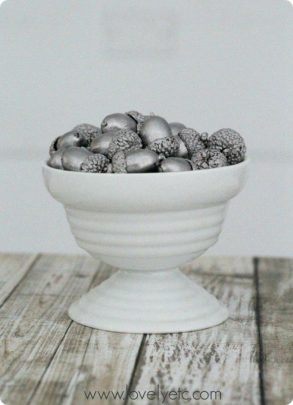 Silver Acorns in a Simple White Goblet
