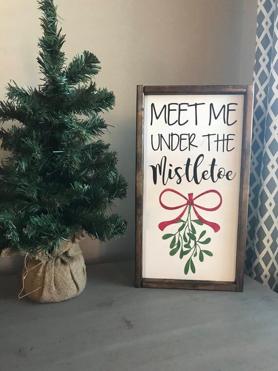 Acima do cartaz da Fazenda de Natal Mistletoe