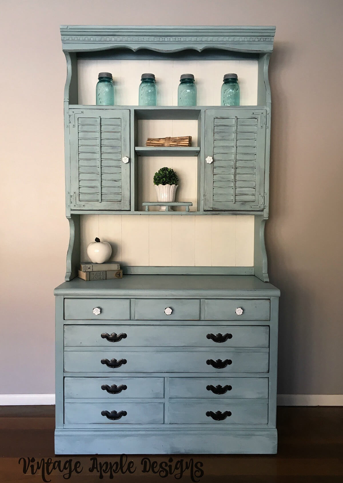 black dresser with shelves