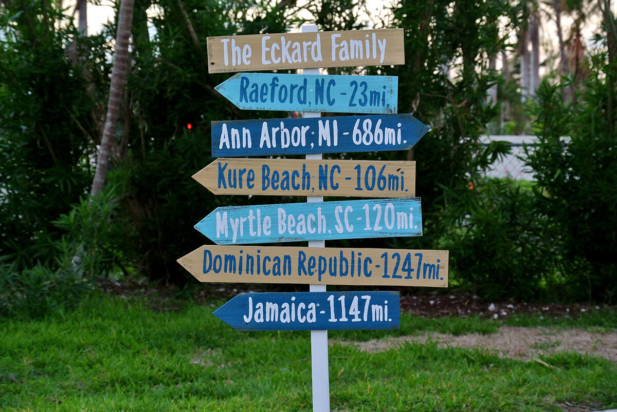 Directional Mileage Family Name Sign