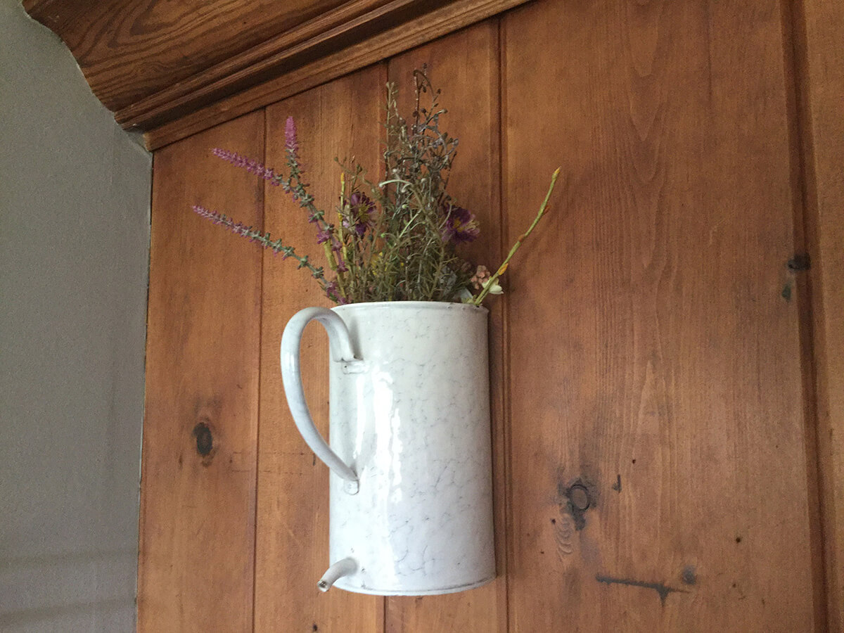 Watering Can Turned Floral Sconce