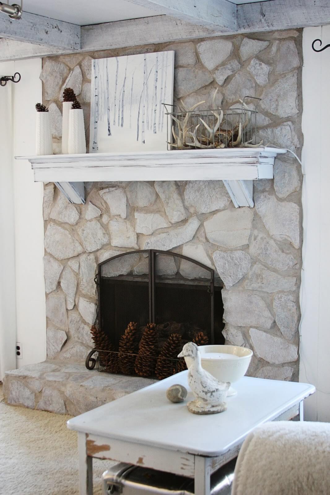 whitewash stone fireplace before and after