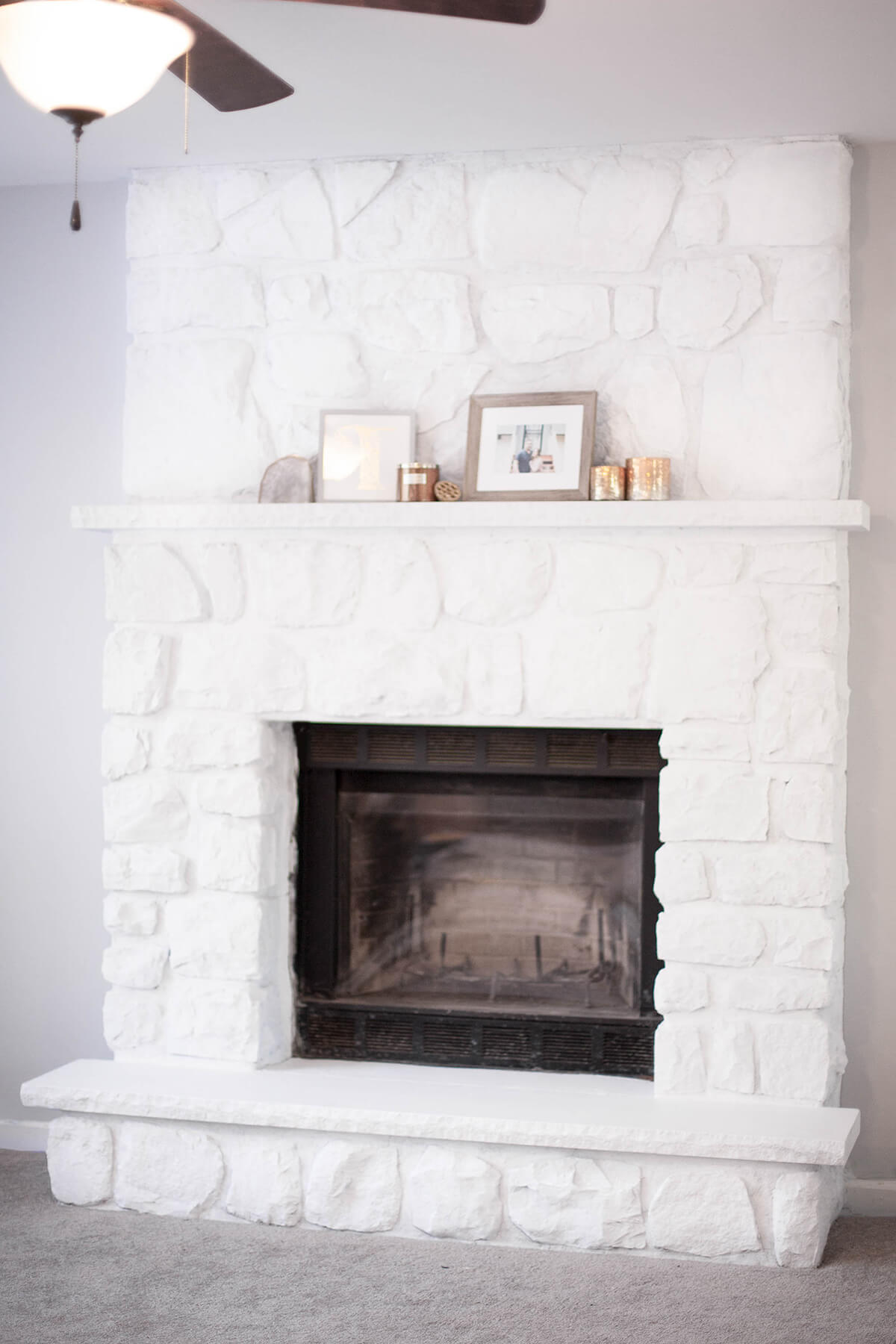 Modern White Stone Fireplace and Hearth Makeover