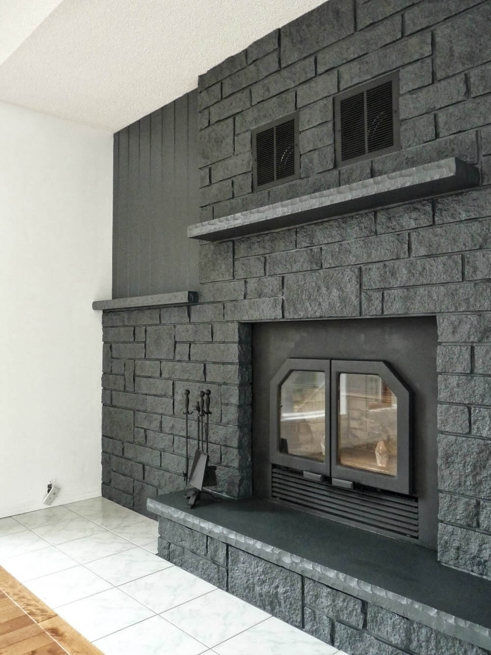 Dramatic Modern Charcoal Gray Fireplace Wall De-Cluttering