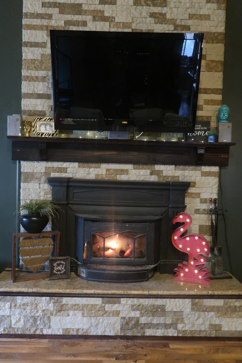 Multicolored Floor to Ceiling Airstone Fireplace Renovation