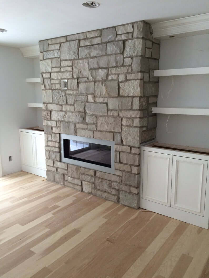 Shelves With Perfect Lighting To Frame, Stone Fireplace With White Bookshelves