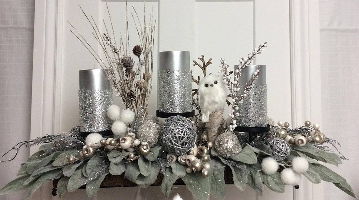 Silver Woodland Candles on Poinsettia Leaves