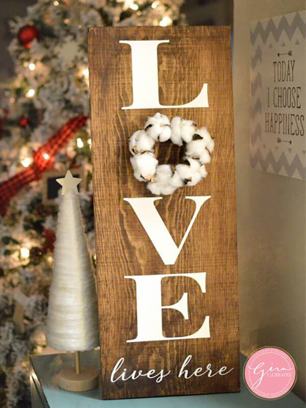 Pretty Cotton “Love Lives Here” Sign