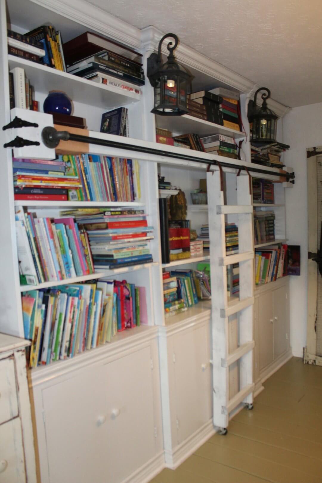 Built-in Shelves with Attached Library Ladder