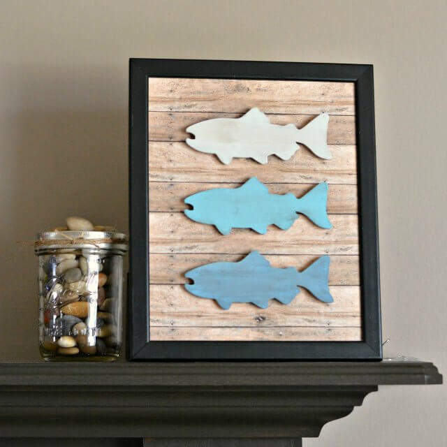 White to Blue Fish Trio on Wood Planks with Black Frame