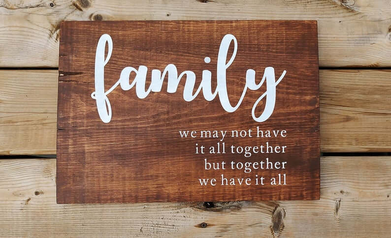 Rough Brown Wooden Family Sign with White Lettering