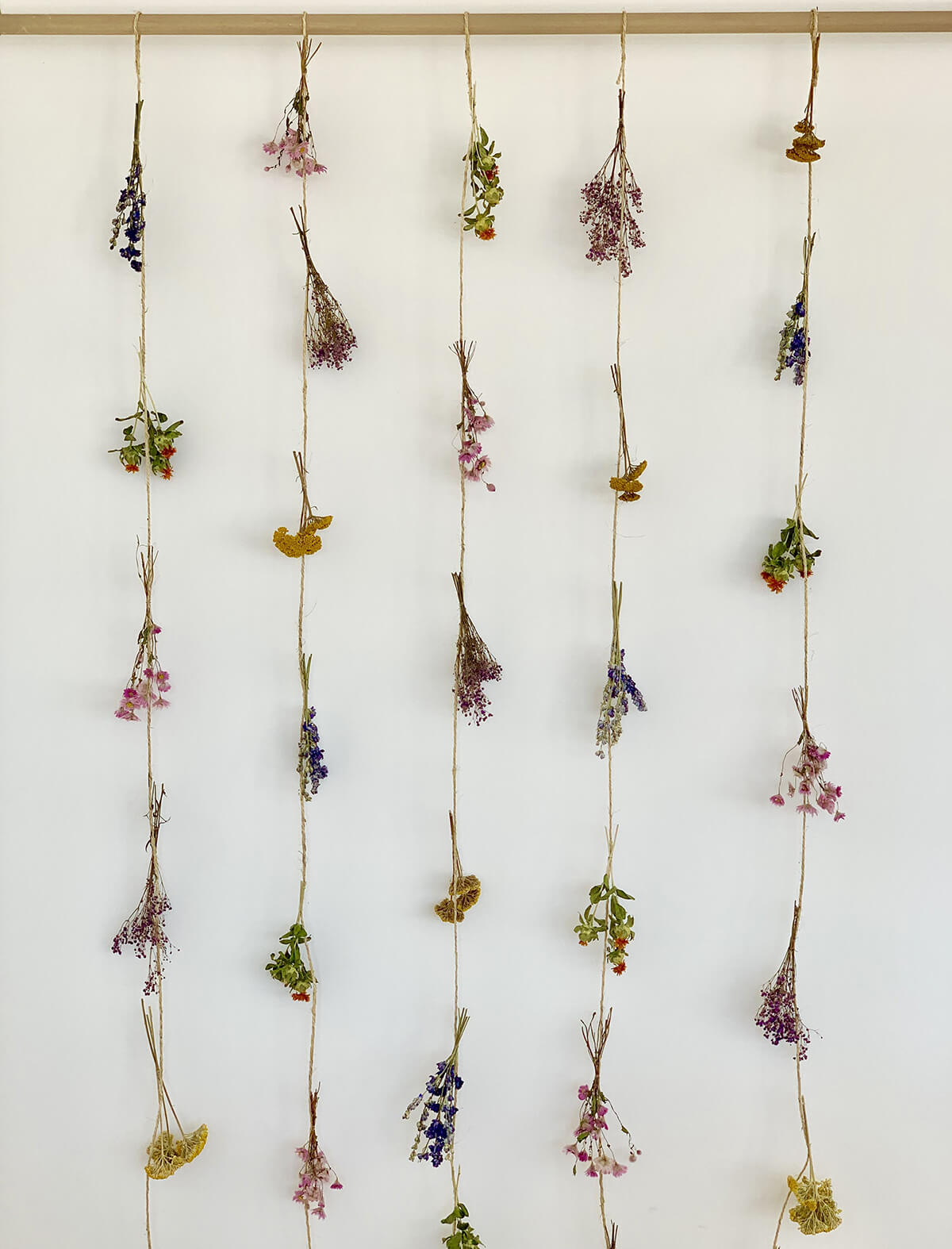 Hanging by a Thread and Beautifully Dried Out Flower Garland