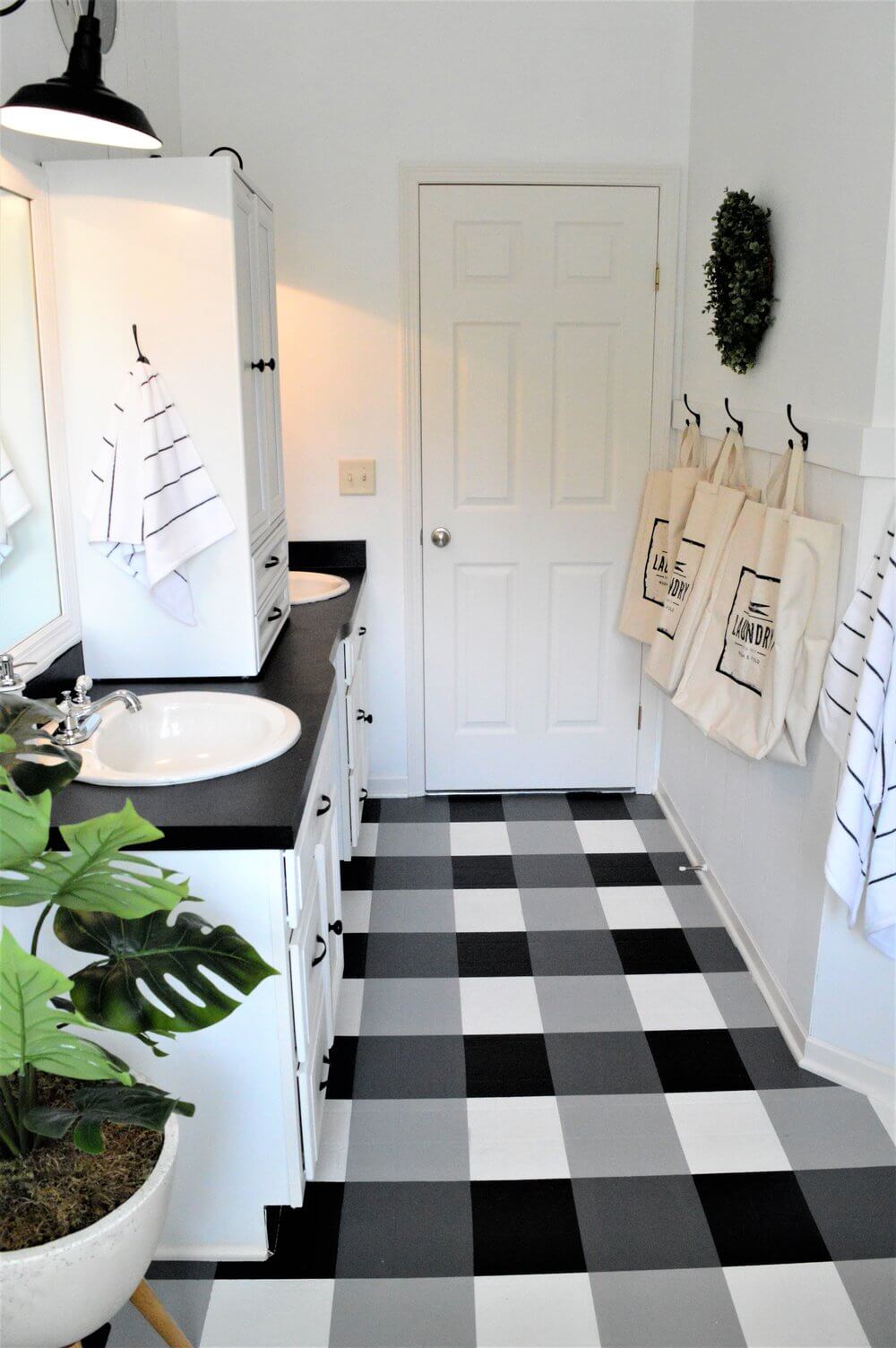 Black, White, and Plaid All Over the Bathroom Floor