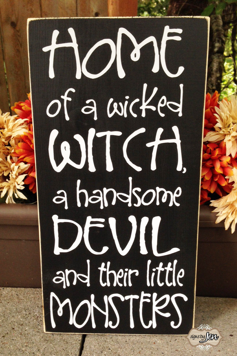 A Witch, A Devil, and Some Little Monsters Sign