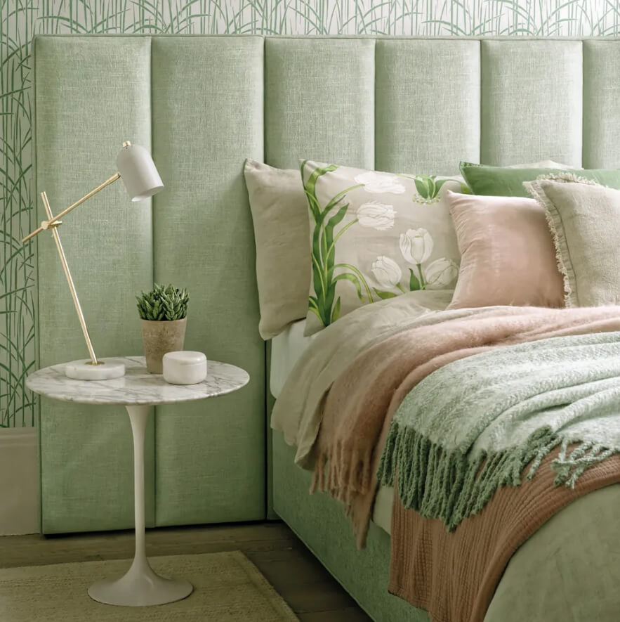Upholstered Green Headboard and Bamboo Wallpaper