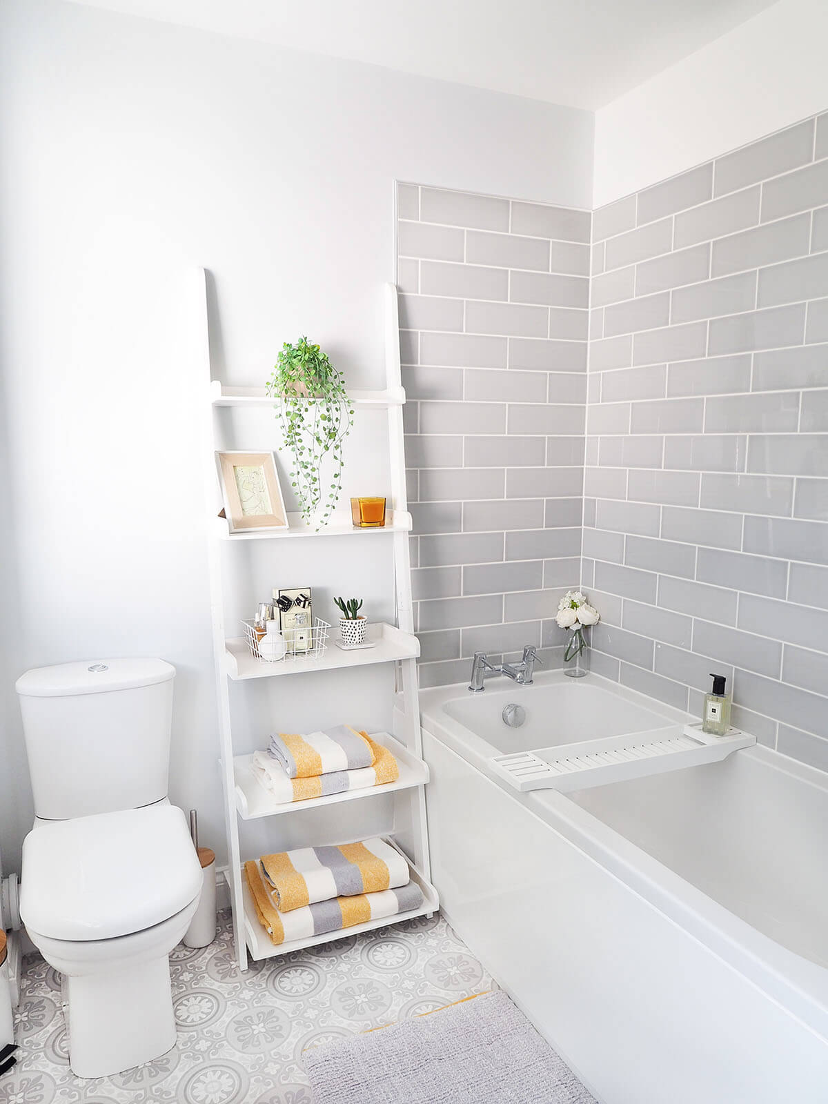 Wide Flat Shelving Between Bathroom Fixtures