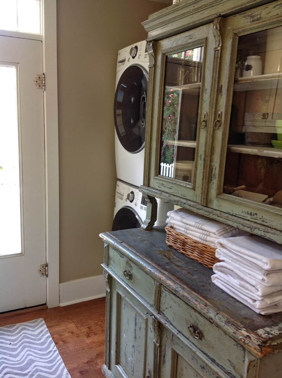 Repurposed Dining Hutch Turned Laundry Cabinet