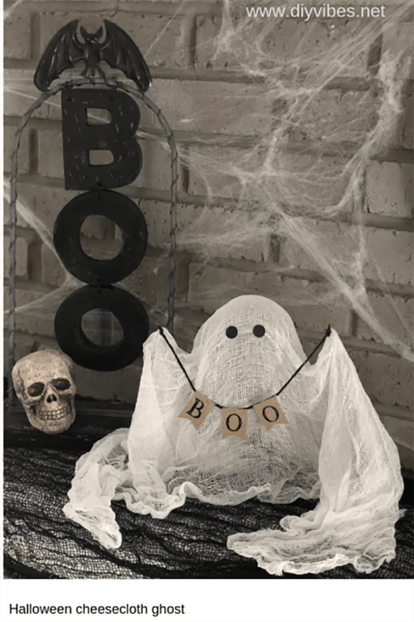 Sign Carrying Cheesecloth Ghost Design