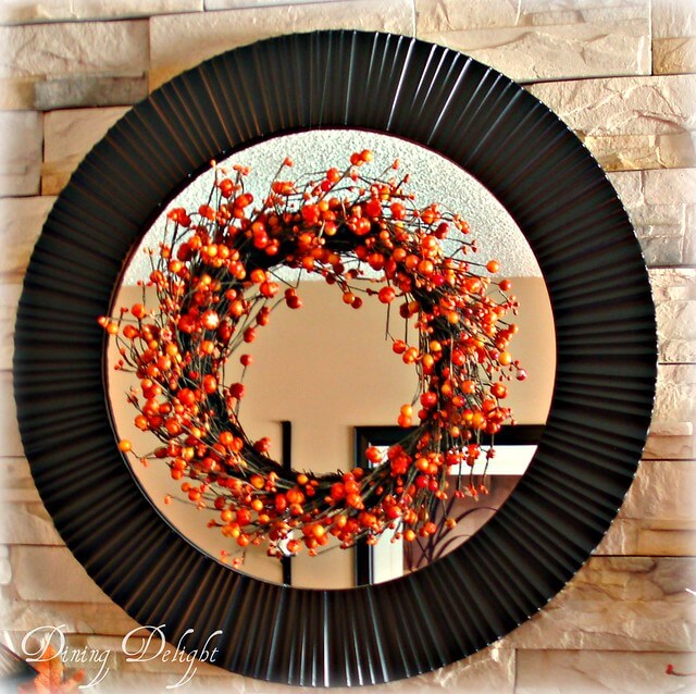 Red Orange Berry Wreath on a Mirror