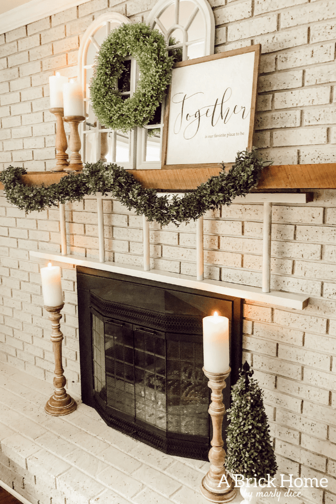 Pretty Cream Brick Fireplace with Unique Mantel