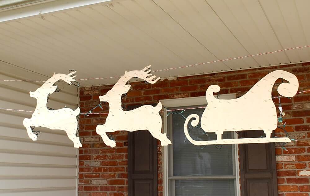 Lighted Cut Out Reindeer and Sleigh