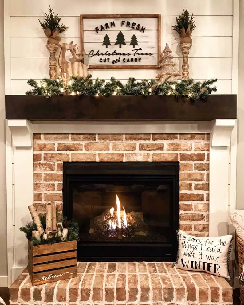 living room with brick fireplace