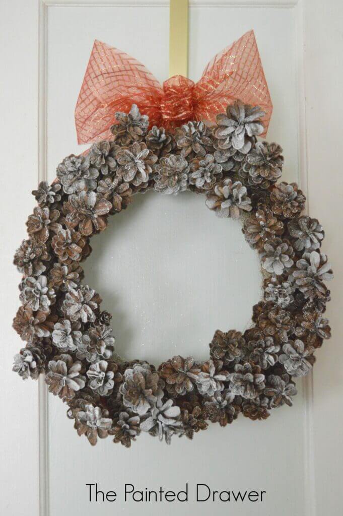 Simple Snow-Tinged Pine Cone Wreath