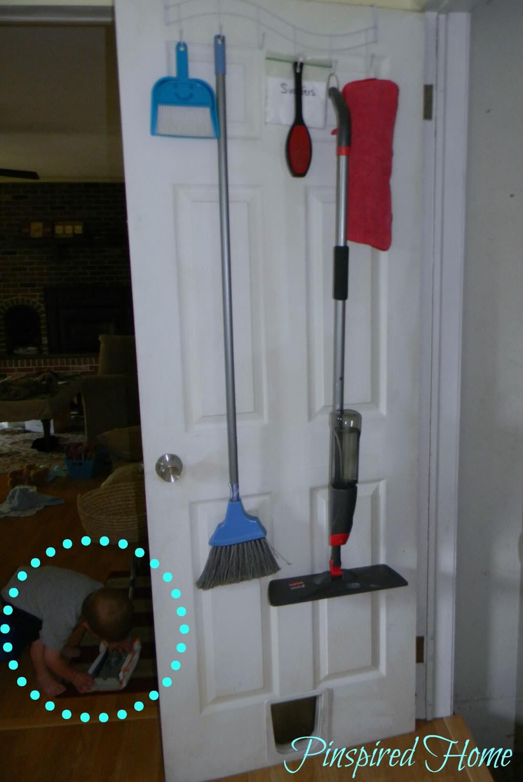Over-the-Door Coathanger Becomes Cleaning Tool Organizer