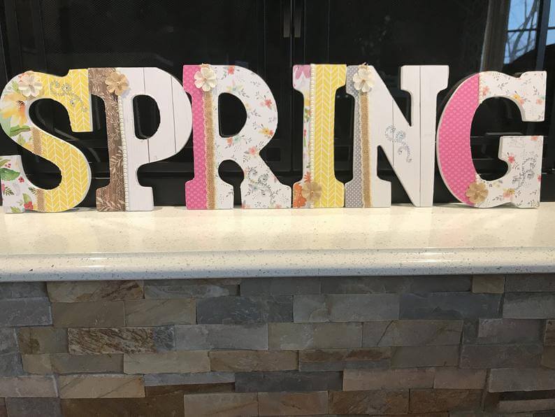 Decorated Wooden Letter Cutouts to Spell “Spring”