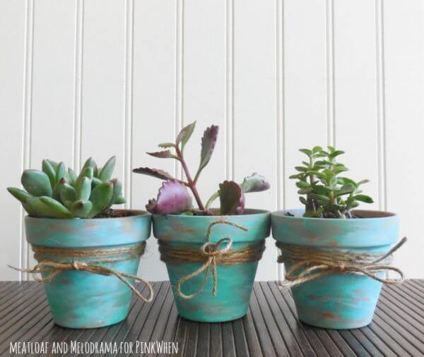 Worn Old Pots With Twine