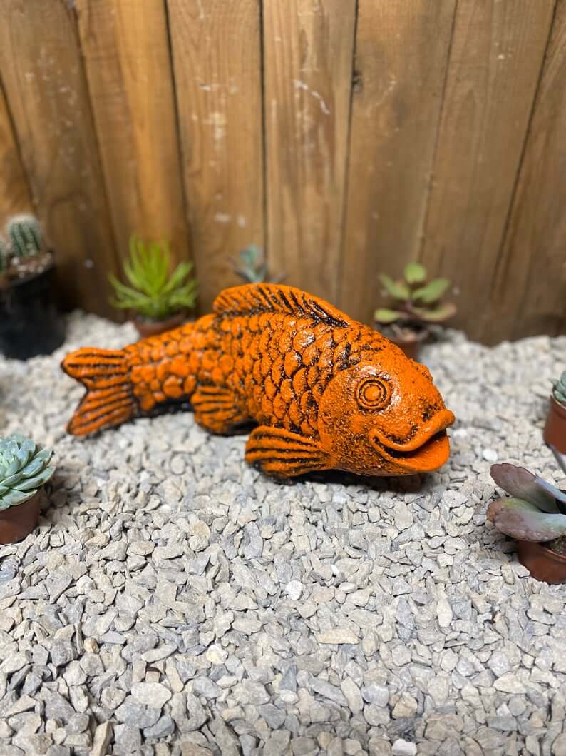 Bold and Bright Orange Painted Concrete Koi