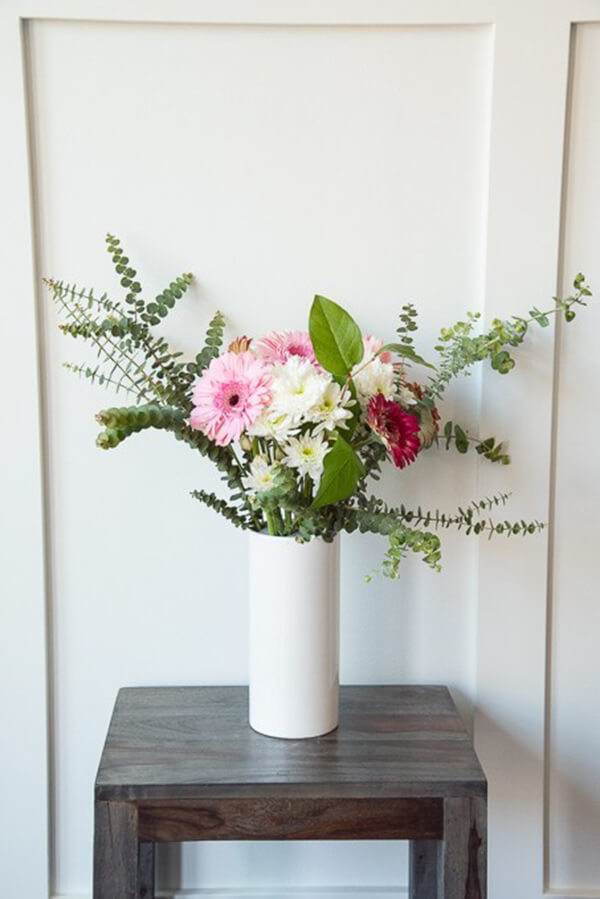 Make a Statement with a Tall White Vase