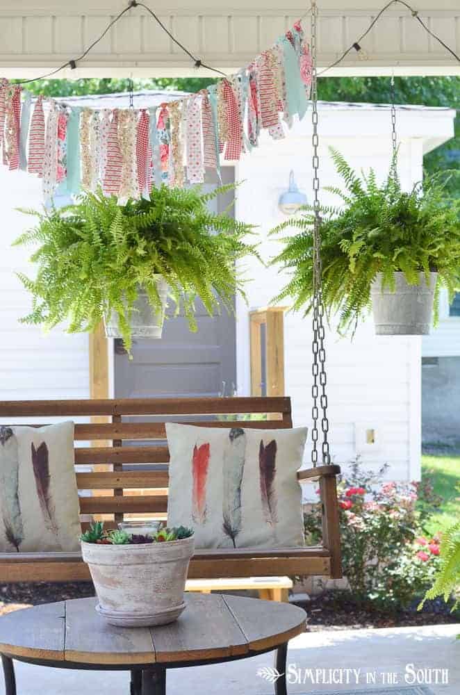 Overhead Overload with Lights, Ferns, and Fabric Garland