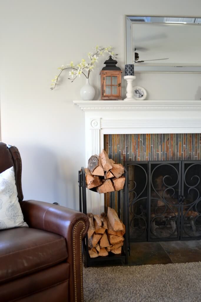 Vertical Multicolored Tile and White Fireplace