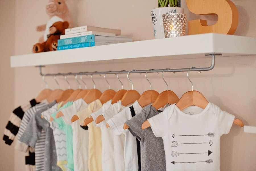 Dainty and Industrial Rod Baby Clothes Display