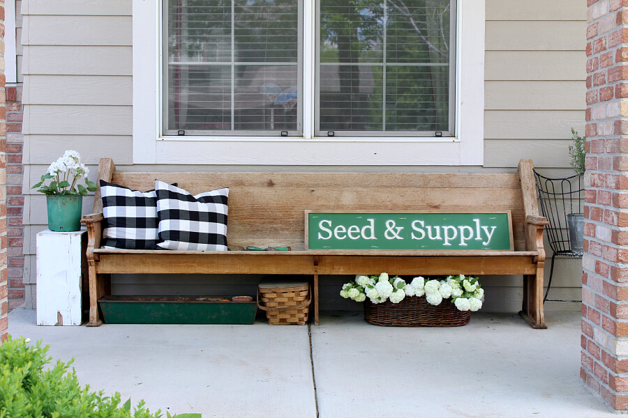 Charming Church Pew Finds Peace on the Porch